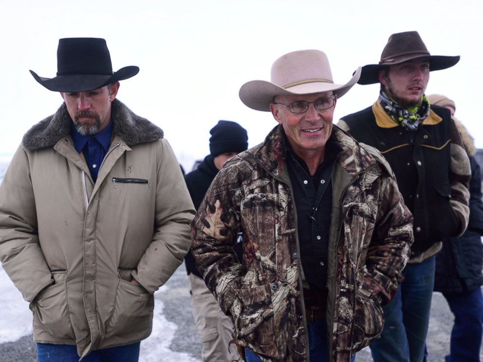 PHOTO: Occupier Robert LaVoy Finicum, center, speaks to press at the Malheur National Wildlife Refuge headquarters near Burns, Ore., on Jan. 9, 2016.