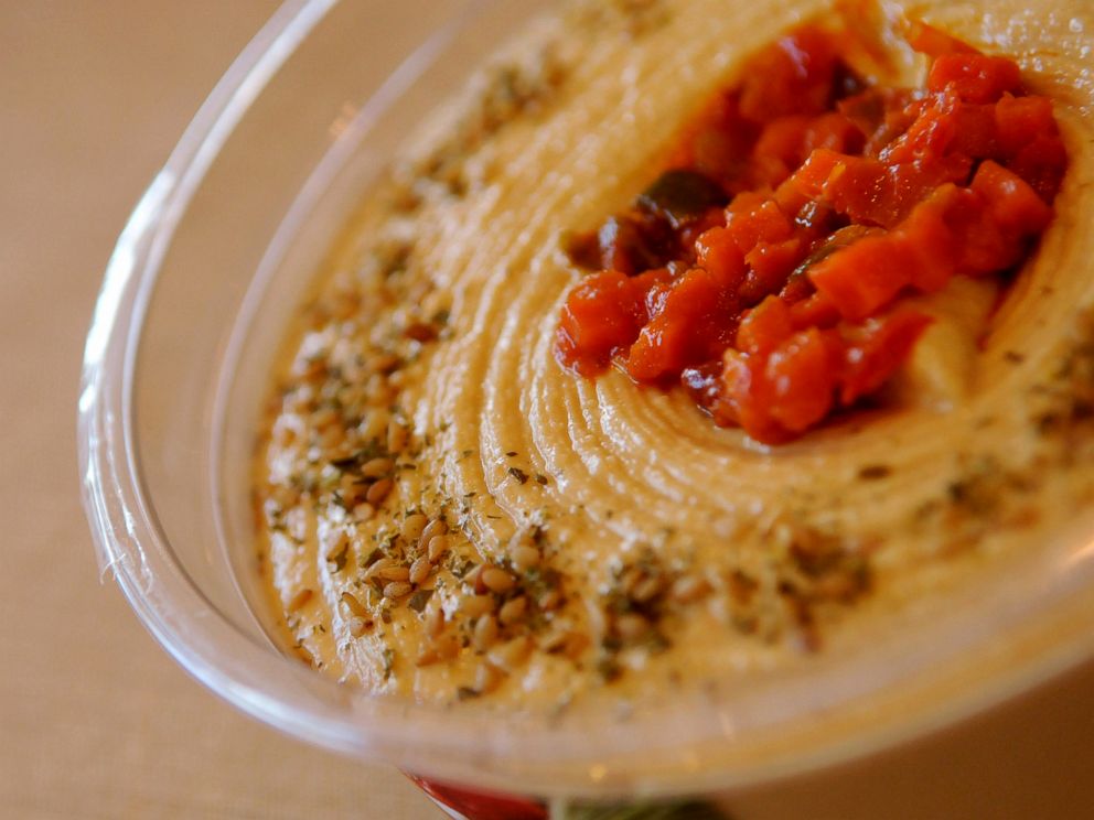 PHOTO: In this July 12, 2012 file photo, a sample of Sabra hummus is set out during a groundbreaking ceremony for the expansion of Sabra Dipping Co.'s Chesterfield County, Va. production facility. Sabra Dipping Co.