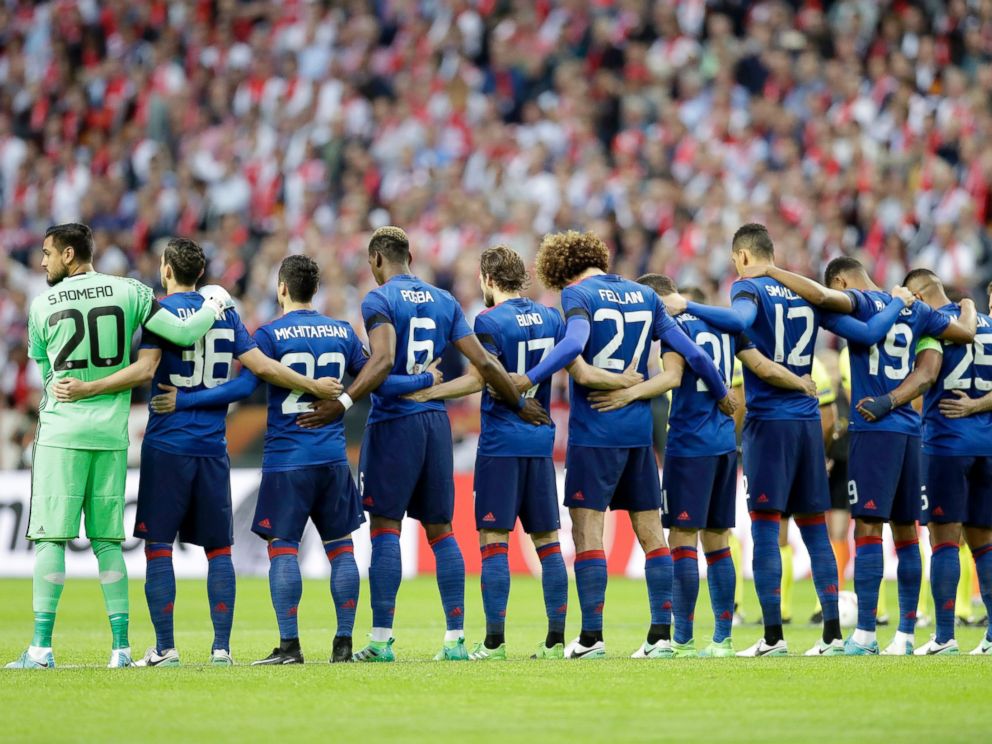PHOTO: Manchesters team observe a minute of silence to commemorate the victims of the Manchester attack prior to the start of the Europa League final between Ajax Amsterdam and Manchester United at the Friends Arena in Stockholm, Sweden, May 24, 2017.