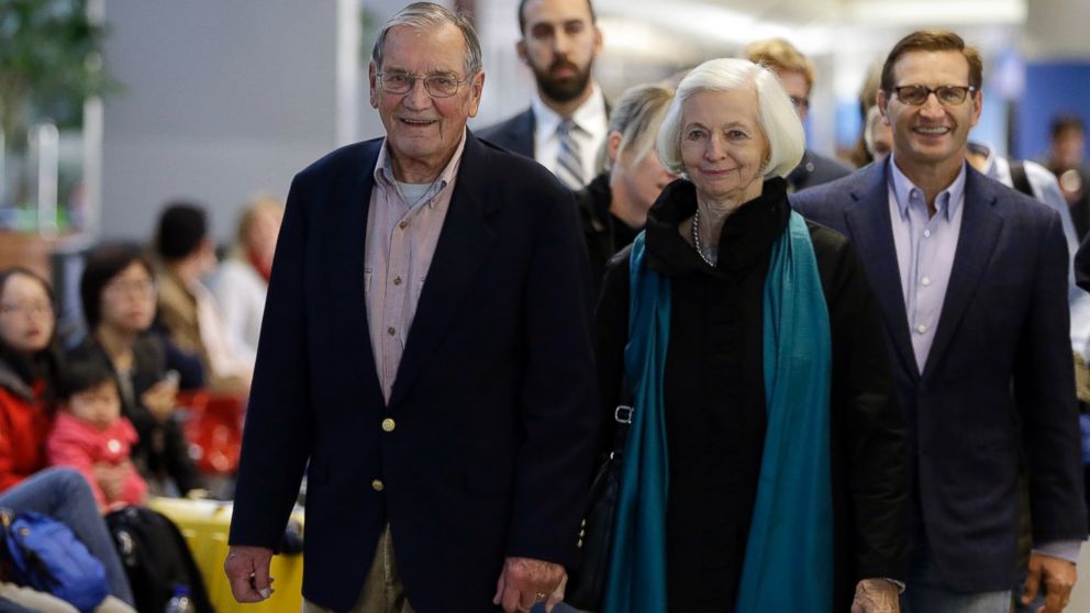 PHOTO: Merrill Newman, left, walks beside his wife Lee and son Jeffrey after arriving at San Francisco International Airport, Saturday, Dec. 6, 2013, in San Francisco.