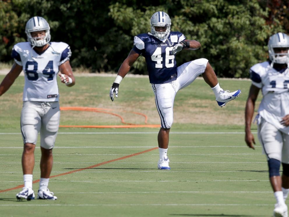 PHOTO: Dallas Cowboys practice squad player defensive end Michael Sam (46) warms up on the field during team practice, Sept. 3, 2014, in Irving, Texas.