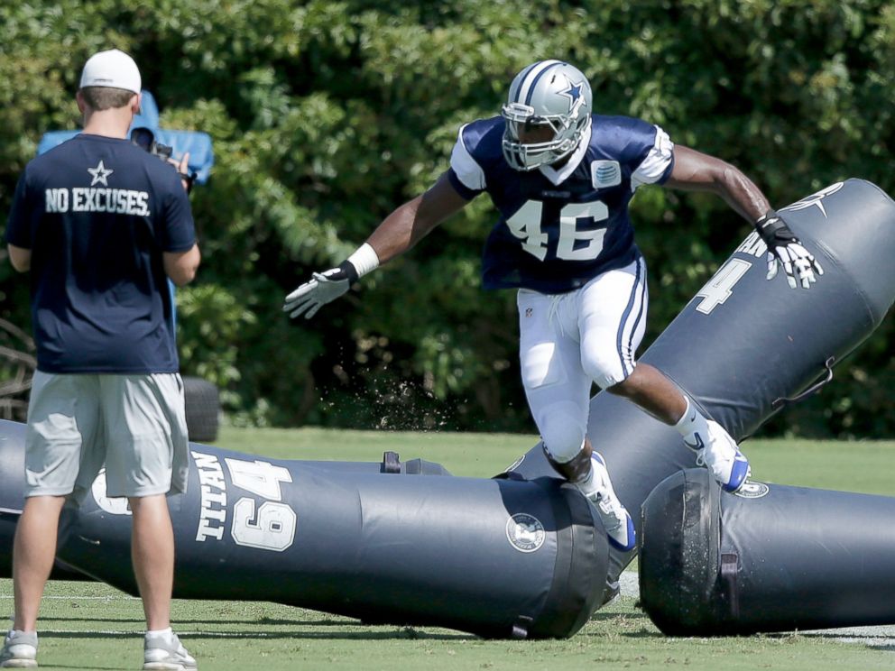 PHOTO: Dallas Cowboys practice squad player defensive end Michael Sam (46) warms up on the field during team practice, Sept. 3, 2014, in Irving, Texas.