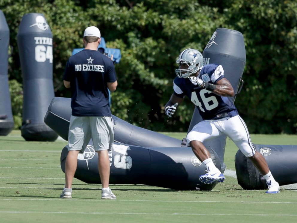 PHOTO: Dallas Cowboys practice squad player defensive end Michael Sam (46) warms up on the field during team practice, Sept. 3, 2014, in Irving, Texas.