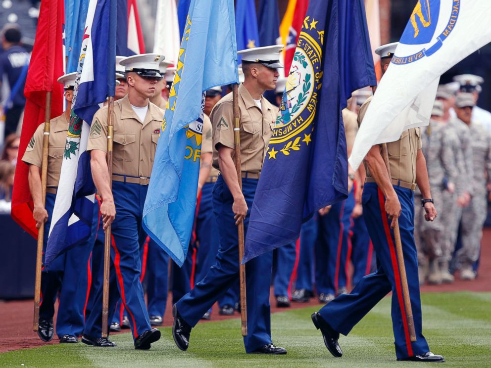 PHOTO:Members of the military walk onto the field for pre-game ceremonies prior to the Colorado Rockies playing the San Diego Padres in a baseball game, April 14, 2013, in San Diego.
