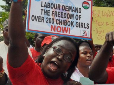 PHOTO: People attend a demonstration calling on the government to rescue the kidnapped school girls from the Chibok government secondary school, outside the defense headquarters in Abuja, Nigeria, May 6, 2014.