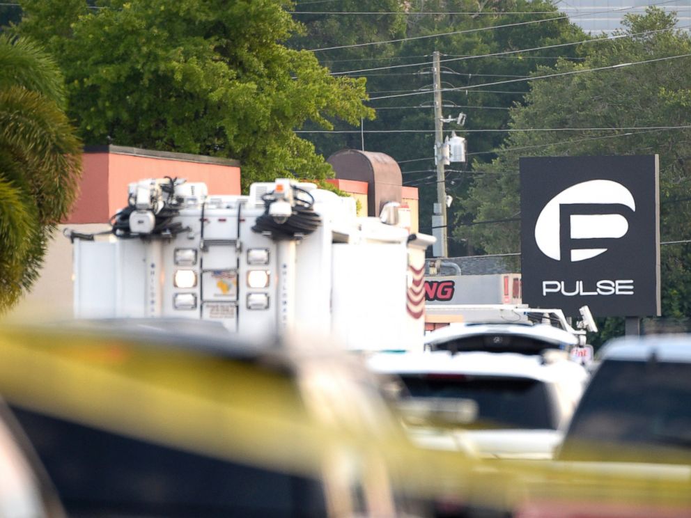 PHOTO: Police cars and emergency vehicles surround the Pulse Orlando nightclub, the scene of a fatal shooting, in Orlando, Fla., June 12, 2016. 