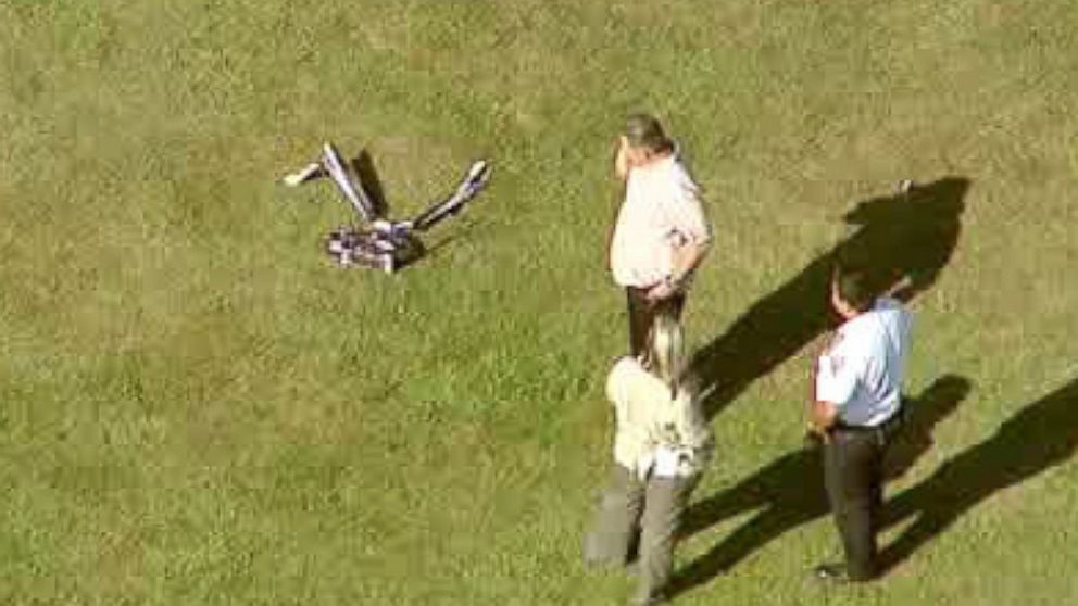 PHOTO: In this image taken from video and provided by WABC-TV in New York, investigators stand near a remote controlled toy helicopter that apparently struck and killed a 19-year-old man Sept. 5, 2013.