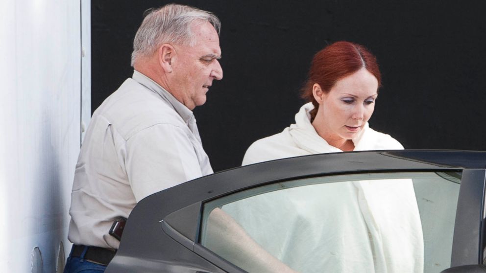 PHOTO: Shannon Richardson is placed into a Titus County Sheriffs car after an initial appearance at the federal building Texarkana, Texas, June 7, 2013.