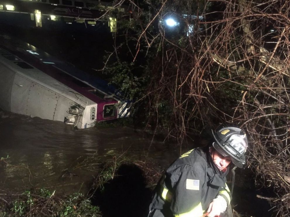 PHOTO:In this image provided the Alameda County Fire Department, first responders work the scene after a car of a commuter train plunged into Alameda Creek after the train derailed, March 7, 2016, in Alameda County, Calif.
