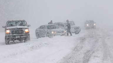 PHOTO: Cars are seen off the side of the road that evidently spun out on I-43 northbound at N. Port Washington Rd. near Port Washington, Wis., Sunday, Dec. 22, 2013.