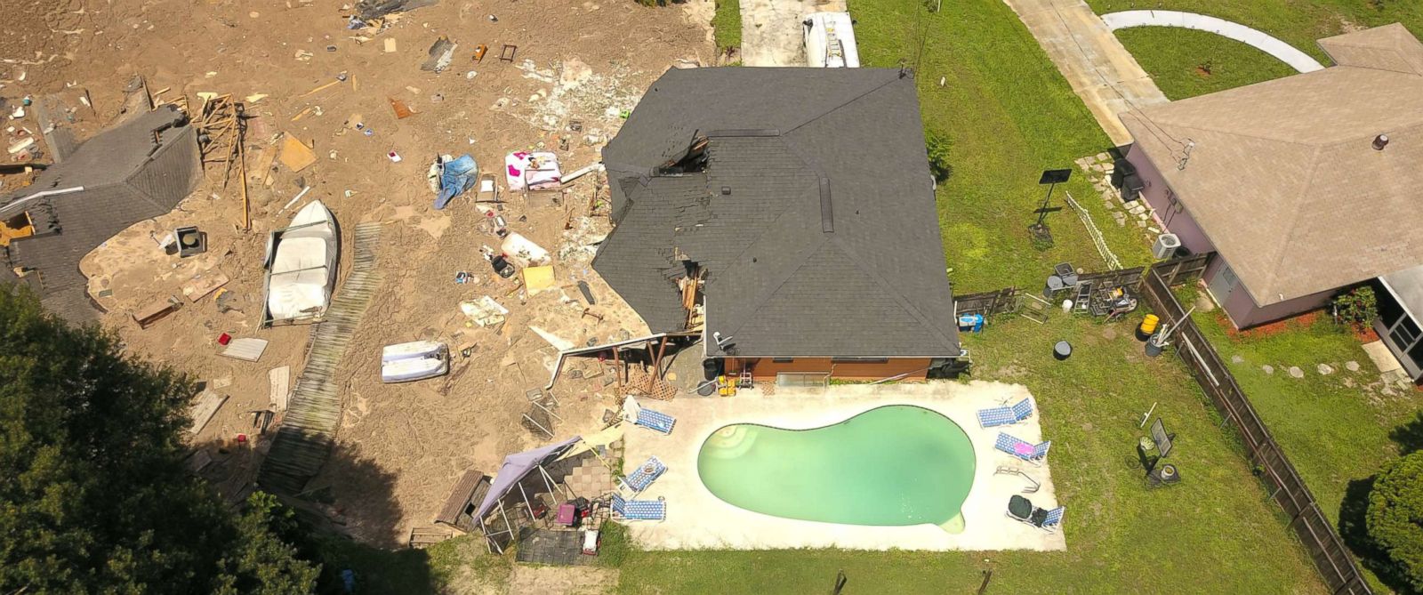 Florida Sinkhole Swallows Boat 2 Houses Others At Risk Abc News