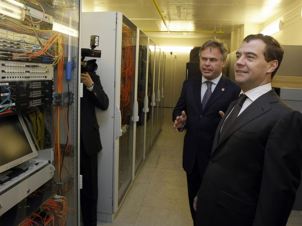 PHOTO: Russian President Dmitry Medvedev (R) listens to Russian antivirus program developer, Yevgeny Kaspersky, as he visits the Kaspersky Labs company development center, on June 18, 2009, in Moscow.
