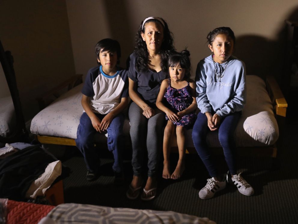 PHOTO: Jeanette Vizguerra, 45, sits with her U.S.-born children, Roberto, 10, Zury, 6, and Luna, 12 while taking sanctuary at the First Baptist Church, May 5, 2017, in Denver.