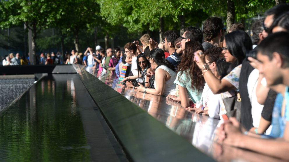 PHOTO: Tourists are pictured visiting the National 9/11 Memorial Museum in New York City on May 25, 2014.