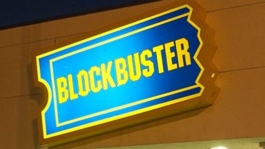 PHOTO: Customers walk into a Blockbuster Video store on Nov. 19, 2002 in Miami, Florida.