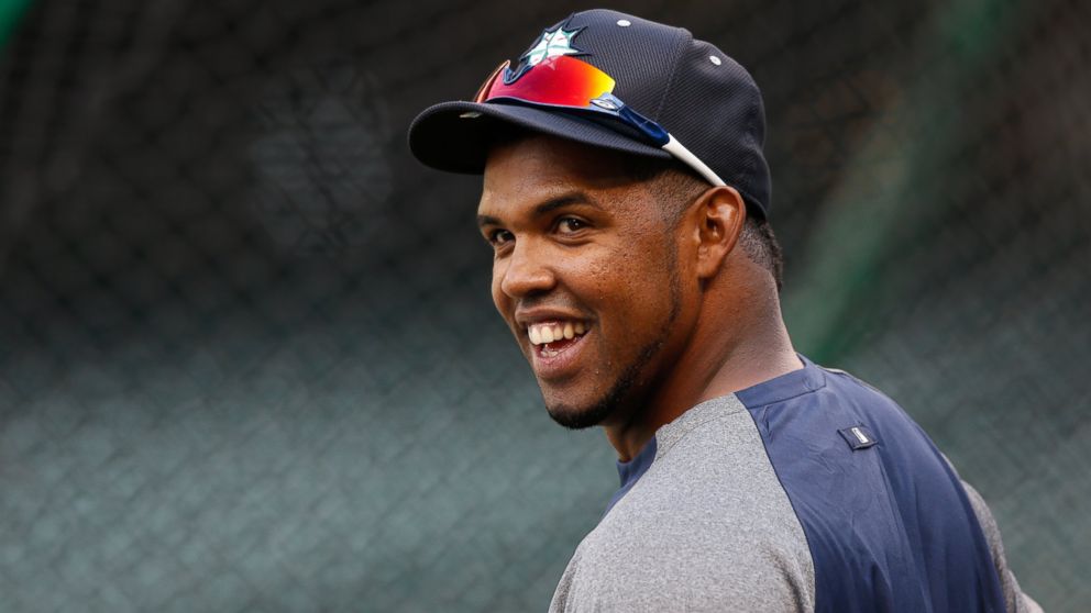 PHOTO: Carlos Peguero looks on during batting practice