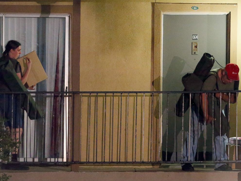 PHOTO: Volunteers from the Red Cross deliver blankets and other supplies to a unit at the Ivy Apartments, where the confirmed Ebola virus patient was staying, on Oct. 2, 2014 in Dallas, Texas.