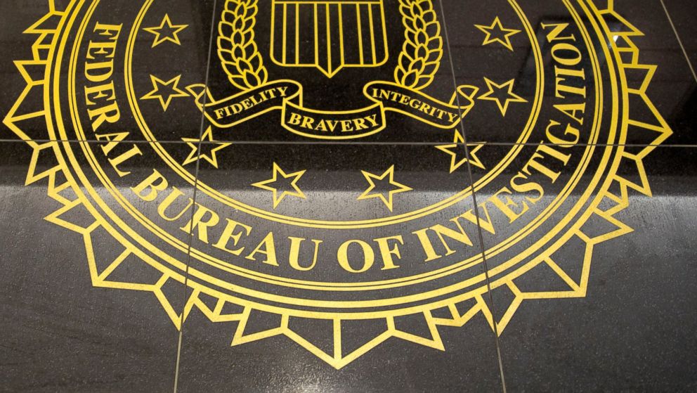 PHOTO: The seal of the Federal Bureau of Investigation is seen on the floor at the FBIs Washington field office in Washington, D.C. on March 13, 2014.