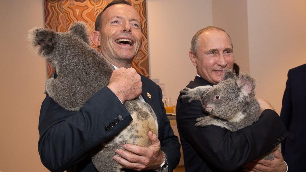 PHOTO: Australias Prime Minister Tony Abbott and Russias President Vladimir Putin