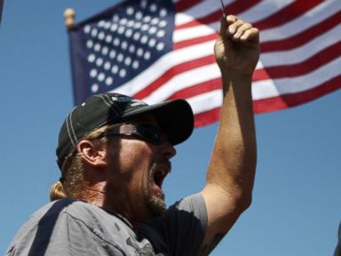 Immigration Supporters Take Stand Against Those Blocking Buses