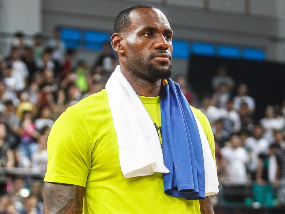 PHOTO: LeBron James of the Cleveland Cavaliers meets fans at Guangzhou Sport University, July 22, 2014, in Guangzhou, China.