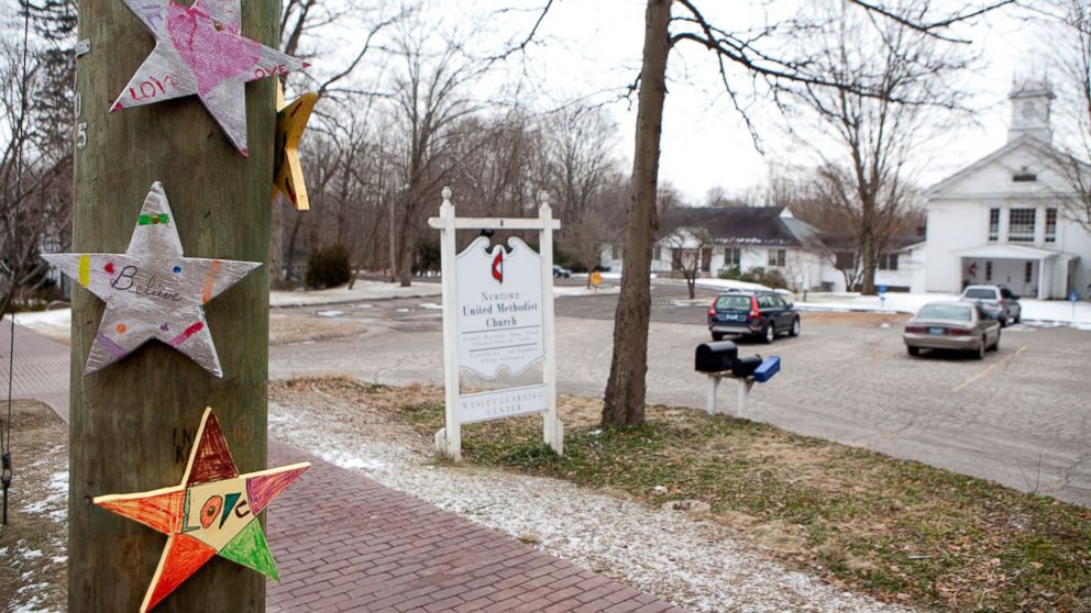 PHOTO: Hearts from well-wishers hang on a telephone pole in front of the United Methodist Church, Feb. 5, 2013 in Newtown, Conn.