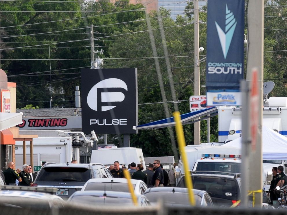 PHOTO: Orlando police officers are seen outside of Pulse nightclub after a fatal shooting and hostage situation on June 12, 2016 in Orlando, Fla.