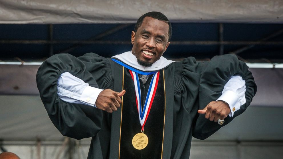 PHOTO: Sean Combs does a little dance across the stage while he delivers his keynote address during Howard Universitys commencement ceremonies, May, 10, 2014 in Washington.