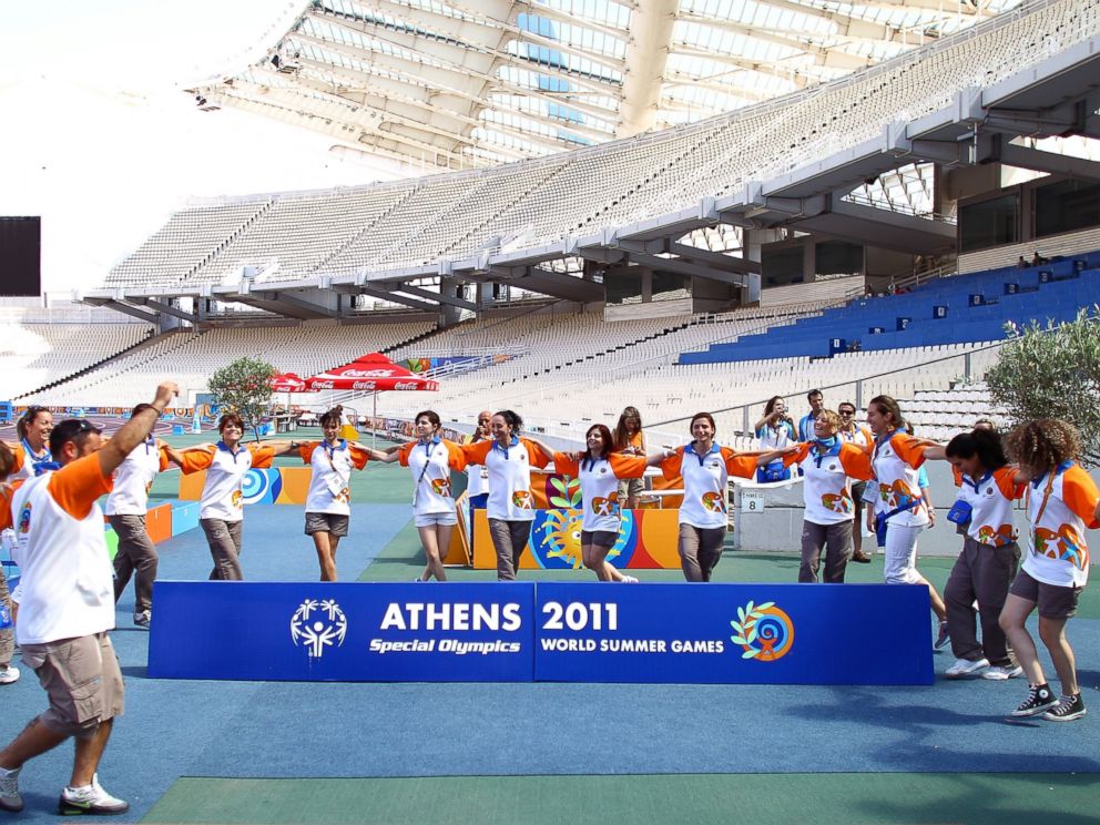 PHOTO: Volunteers dance a traditional Greek dance Syrtaki after the athletics competition of the Athens 2011 Special Olympics World Summer Games in Athens, Greece, June 30, 2011 . 