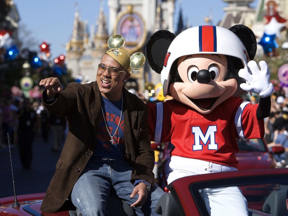 PHOTO: Super Bowl MVP Hines Ward of the Pittsburgh Steelers and Mickey Mouse wave at fans during a parade at Walt Disney Worlds Magic Kingdom, Feb. 6, 2006 in Lake Buena Vista, Fla.
