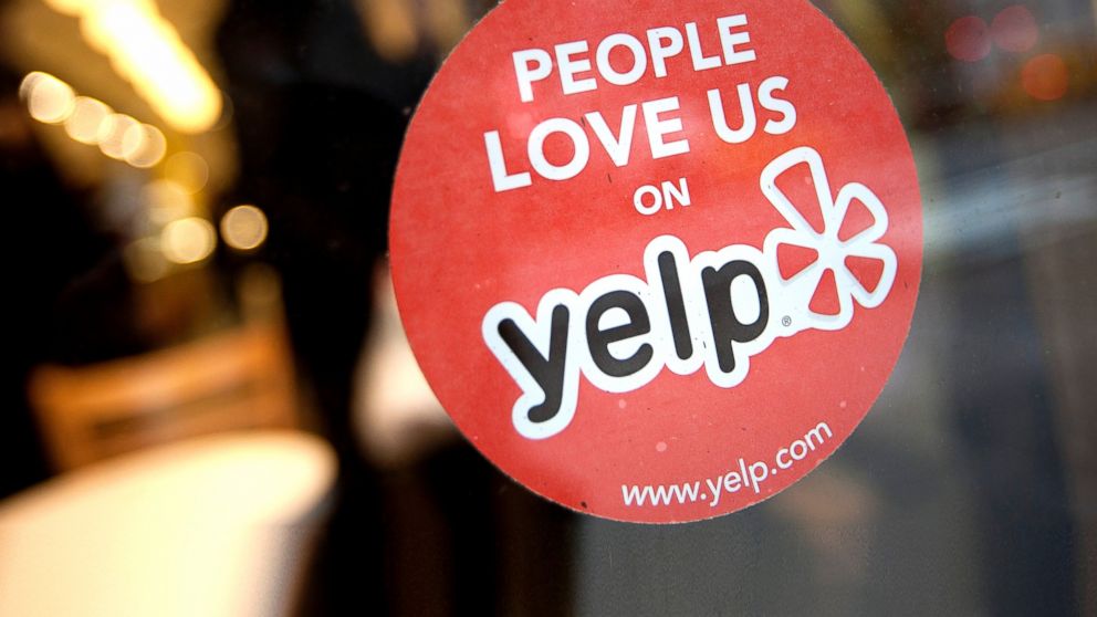 PHOTO: The Yelp Inc. logo is displayed in the window of a restaurant in New York, March 1, 2012.