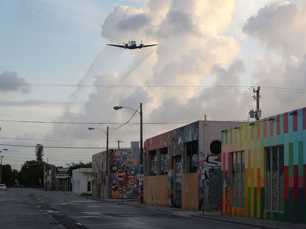 PHOTO: A plane sprays pesticide over the Wynwood neighborhood in the hope of controlling and reducing the number of mosquitos, some of which may be capable of spreading the Zika virus