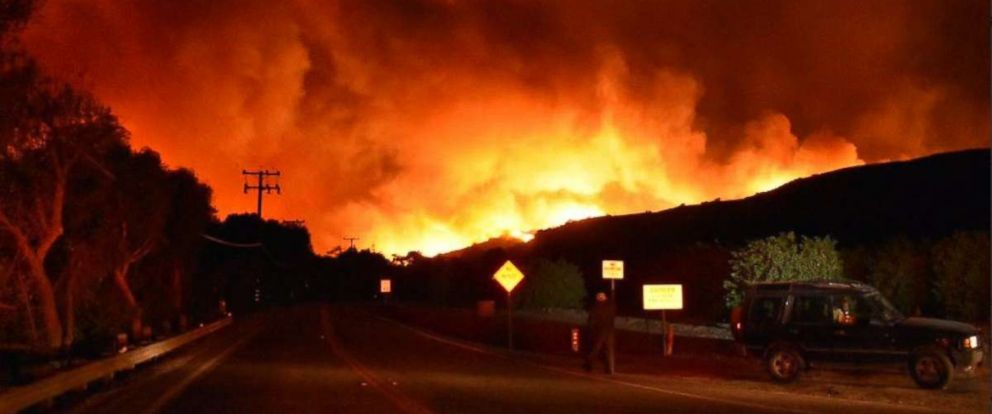 PHOTO: Firefighters battle a fast-moving wildfire in Southern California that has already charred more than 10,000 acres of land.