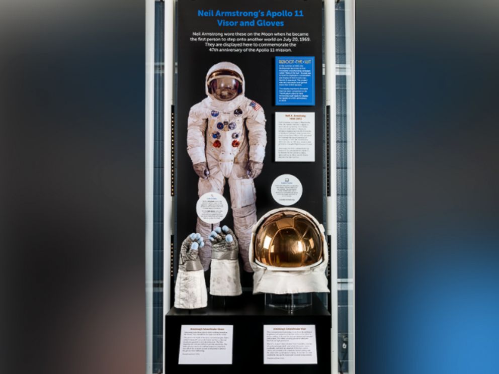 PHOTO: An exhibit of Neil Armstrongs Apollo 11 Visor and Gloves, featuring flown Apollo A-7L spacesuit extravehicular visor and gloves in the James S. McDonnell Space Hangar at the National Air and Space Museums Udvar-Hazy Center, Chantilly, Virginia.