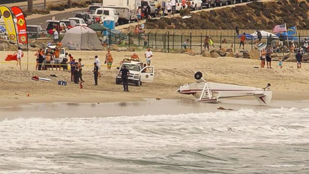 PHOTO: A small plane crash landed Saturday, July 4, 2015, on a beach in Carlsbad, California.