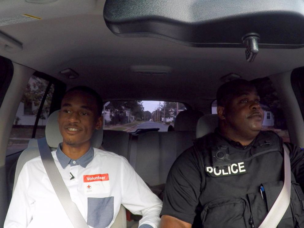 PHOTO: Chris Suggs rides with Sgt. Dennis Taylor of the Kinston Police Department.