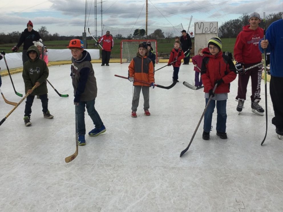 PHOTO:Kids play on Mels Rink. The rink, in Maryland resident Marc Kohns backyard, is in danger of having to be taken down because its not in compliance with local laws.