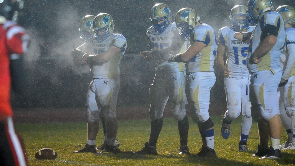 PHOTO: The Newtown High School Football team, pictured in Monroe, Conn. Nov. 26, 2013.