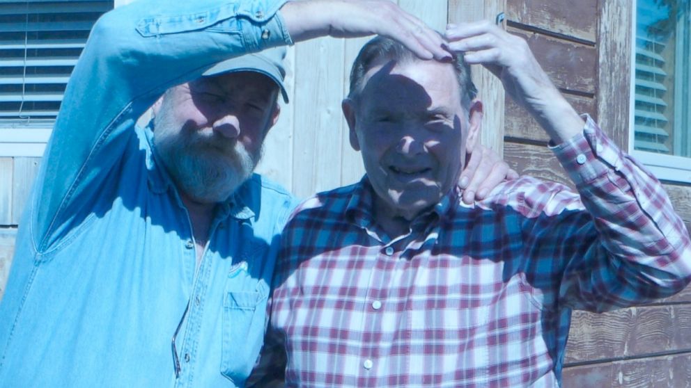 PHOTO: Robert Hutton with his father Chuck Hutton.
