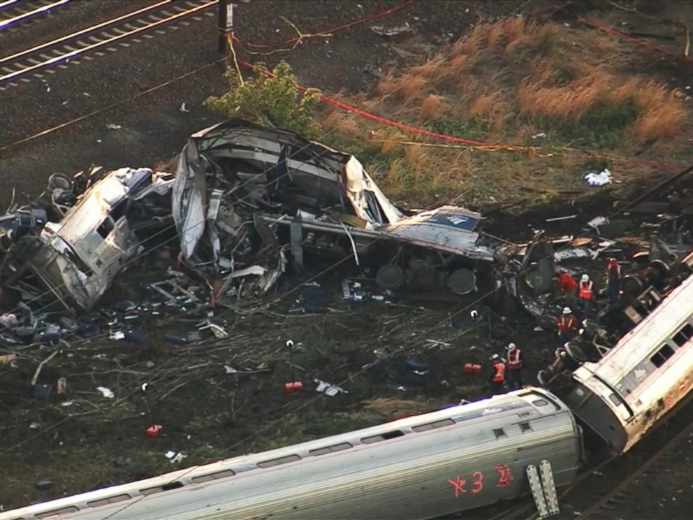 PHOTO: Emergency personnel work the scene of a deadly train wreck, May 13, 2015, in Philadelphia.