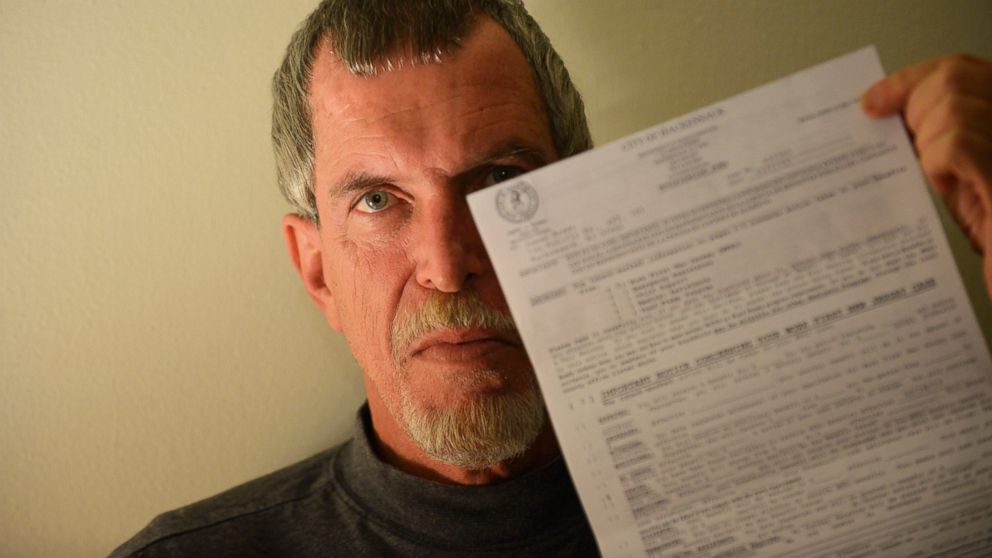 PHOTO: James Brady holds a letter from Hackensack, N.J. denying him General Assistance and Medicaid benefits for not reporting as income $850 he turned in to police.