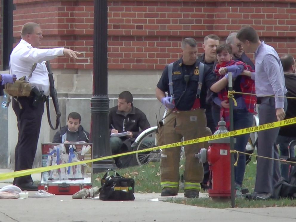 PHOTO: A girl is led to an ambulance by emergency personnel following an attack at Ohio State Universitys campus in Columbus, Ohio, Nov. 28, 2016.