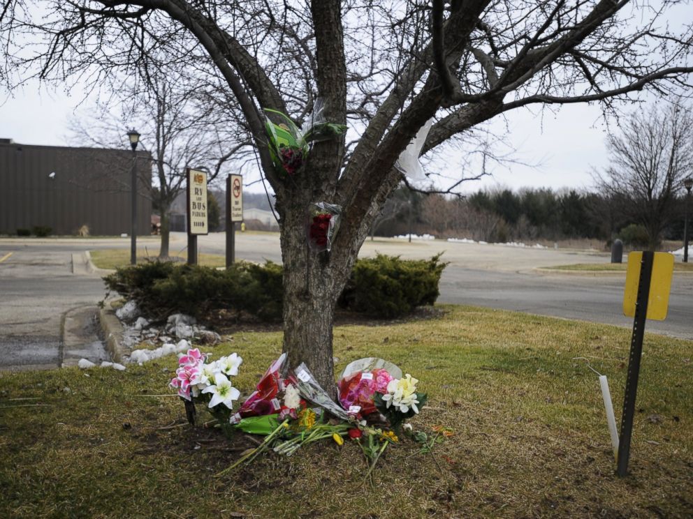 PHOTO: Flowers lay at a makeshift memorial outside a Cracker Barrel restaurant, one of the sites of a series of shootings over the weekend that killed six in Kalamazoo, Michigan, February 22, 2016.
