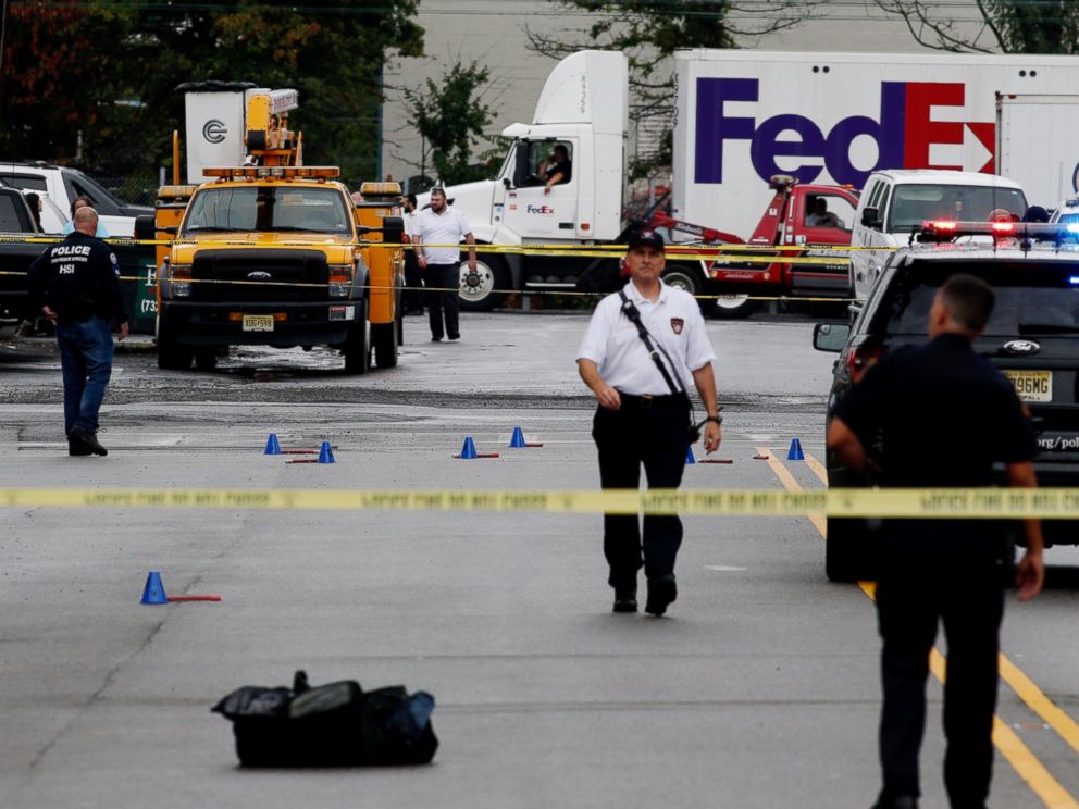 PHOTO: Law enforcement officers mark evidence near the site where Ahmad Khan Rahami, sought in connection with a bombing in New York, was taken into custody in Linden, New Jersey, Sept. 19, 2016. 