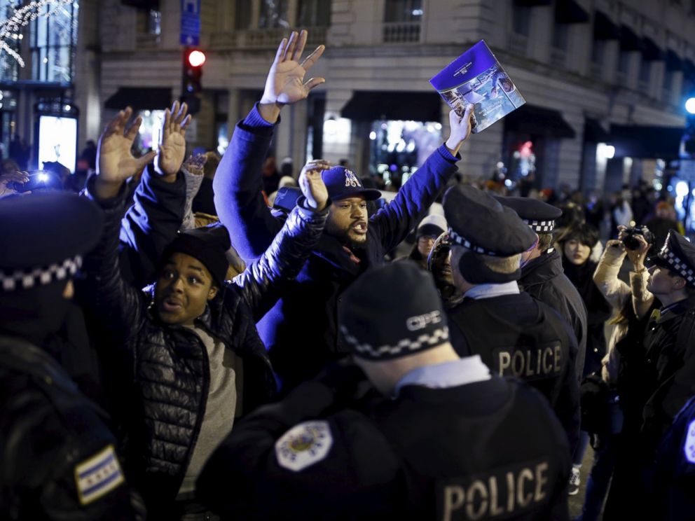 PHOTO: Demonstrators confront police officers during a protest in reaction to the fatal shooting of Laquan McDonald in Chicago, Nov. 27, 2015. Laquan McDonald, 17, was fatally shot by Jason Van Dyke, a Chicago police officer, in October 2014.