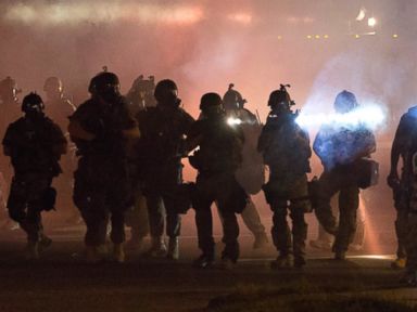 State Trooper in Charge of Ferguson Joins Protest March