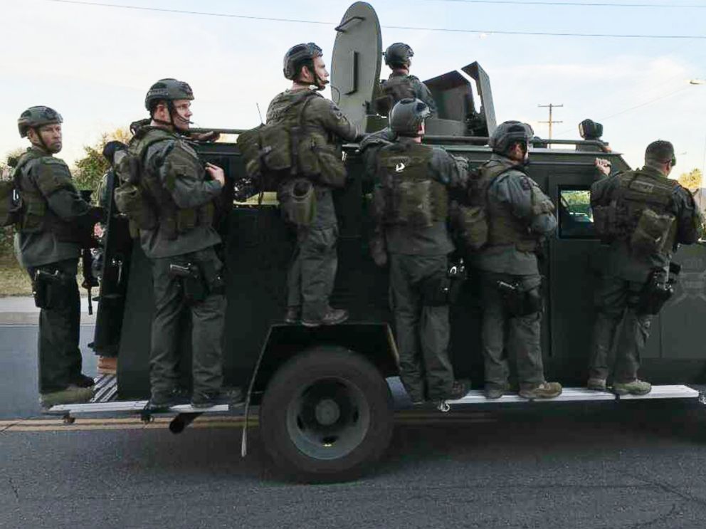 PHOTO: A police SWAT team conducts a manhunt after a mass shooting in San Bernadino, Calif., Dec. 2, 2015.