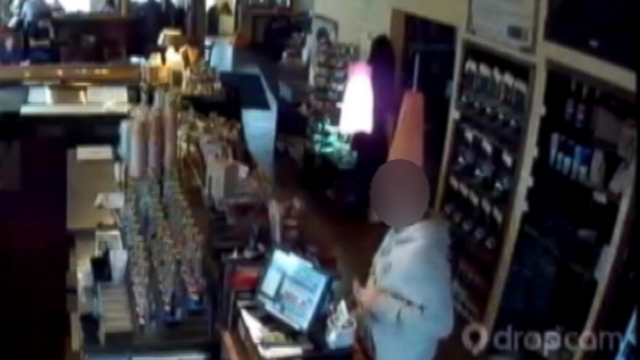 VIDEO: Surveillance video shows the suspect leave an Ohio coffee bar with more than coffee.