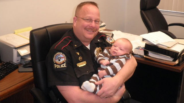PHOTO: Police Chief Mike Maloney seen smiling with his grandson. Maloney, who was only eight days from retirement, was shot and killed during a drug raid.