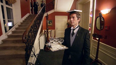 David Muir participates in a butler training drill at International Butler Academy, in Valkenburg, Netherlands.